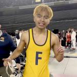 Forks Abraham Montealegre celebrates his state championship at 110 pounds at the Tacoma Dome on Saturday. Montealegre is part of a long line of Forks state champions in wrestling. (Courtesy of Kyle Weakley)