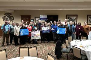 Sequim School District administrators, staffers, families and supporters gather in Stymies Bar and Grill on Feb. 11 after they learned the districts bond and levy proposals were passing. (Matthew Nash/Olympic Peninsula News Group)