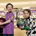 From left, Dennis and Dillon Tisdale of Port Angeles won first- and second-place medals at the  Washington State USBC West Pepsi Sectionals held in Mount Vernon this weekend. (Trish Tisdale)