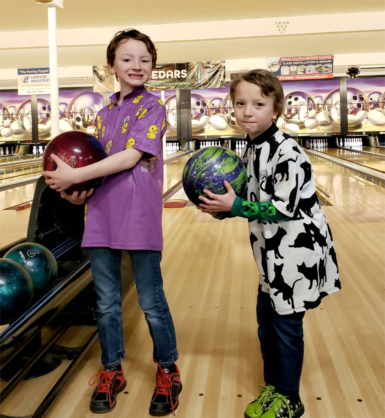 From left, Dennis and Dillon Tisdale of Port Angeles won first- and second-place medals at the Washington State USBC West Pepsi Sectionals held in Mount Vernon this weekend. (Trish Tisdale)