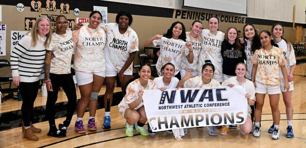 Jay Cline/Peninsula College Athletics The Peninsula College womens basketball team and head coach Alison Crumb celebrate its fourth straight NWAC North Division championship, and eighth league title in program history.