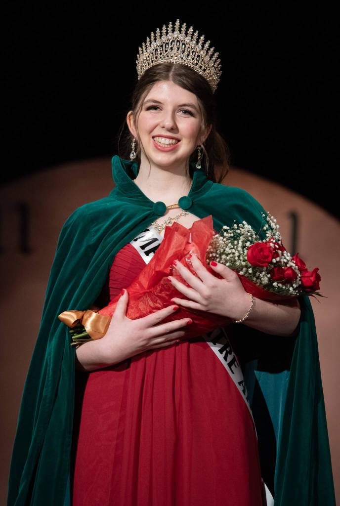 The 130th Irrigation Festivals queen, Lily Tjemsland, receives her crown after participating in the scholarship pageant, which included a monologue performance, a dance routine with her fellow contestants and answering questions, both on stage and off. (Emily Matthiessen/Olympic Peninsula News Group)