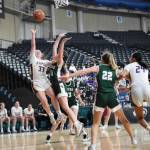 Will Denner/The Columbian
Columbia Rivers Camy Drake (10) goes up for a shot against Port Angeles Lindsay Smith during a Class 2A girls basketball State Round of 12 game at the Yakima Valley SunDome.