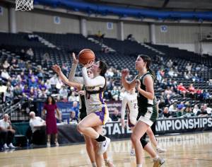 Will Denner/The Columbian
Columbia Rivers Camy Drake goes up for a shot against Port Angeles during a Class 2A girls basketball state round of 12 game on Wednesday at the Yakima SunDome.