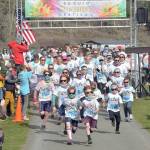 Participants in the Sequim Sunshine Festival Sun Fun Color Run take off from the starting line on Saturday at the Albert Haller Play Fields near Carrie Blake Park. The two-day festival featured numerous activities, food, music and a drone show on Saturday night. (Keith Thorpe/Peninsula Daily News)