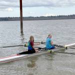 From left, Mariah Disque and Kadence Greul of the Olympic Peninsula Rowing Club competed in the women’s Jr. U17 doubles boat at Vancouver Lake this weekend. (OPRA)