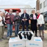 From left: Susan Hillgren, Director of The Answer for Youth, Rotarians Steve Zenovic and Jason Grice working on a project at TAFY along with Bill Koenig, Rotarian and General Manager of Koenig Subaru, Alma Meyrick, Koenig Subaru and Vivian Hansen, Peninsula Daily News.