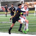 Lonnie Archibald/for Peninsula Daily News 
Forks Estevan Ramos (2) competes with Port Angeles Matthew Miller for the ball on the turf of Spartan Stadium where Port Angeles defeated Forks 2-0.