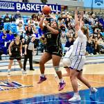Peninsula Colleges Jelissa Julmist (Sequim High School) goes up for a basket against Lane in the NWAC semifinals held in Pasco on Saturday. Defending NWAC champion Lane hit 12 3-pointers and won 80-63, the Titans 45th win in a row as the Pirates season ends with a 24-3 record. In on the play is Peninsulas Ciera Tugade Agasiva. (Jay Cline/Peninsula College).