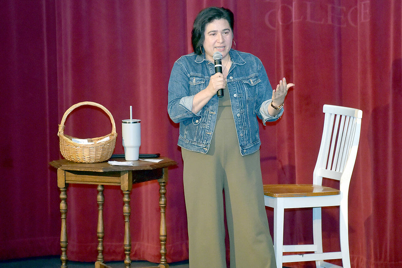 U.S. Rep. Emily Randall, D-Bremerton, speaks about current issues during a town hall meeting on Saturday in the Little Theater at Peninsula College in Port Angeles. Several hundred people attended, including an overflow audience in the Pirate Union Building. (Keith Thorpe/Peninsula Daily News)