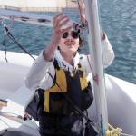 Andrew Corson checks the rigging of his boat before setting sail on Tuesday in Port Angeles. (Keith Thorpe/Peninsula Daily News)