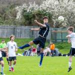 East Jeffersons Manaseh Lanphear-Ramirez goes airborne to head the ball away from Klahowya defenders during a Nisqually League game played in Port Townsends Memorial Stadium on Tuesday. (Steve Mullensky/for Peninsula Daily News)
