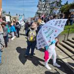 After gathering at First and Laurel streets, protestors walk to the Clallam County Courthouse in Port Angeles. (Leah Leach/For Peninsula Daily News)