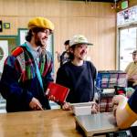 Customers check out at The Pine and Eight, a local goods-only grocery store co-owned by SisterLand Farms and Northwest Beach Work. This store, which recently opened at 511 W. Eighth St. in Port Angeles, is an experiment testing out the viability of a farmer- and artisan-owned store selling Washington-only products. (Eli Smith)