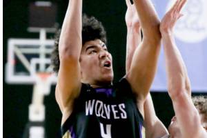 Photo by Dylan Wilhelm, Daily Chronicle/
Sequim's Jericho Julmist goes up for a shot on March 5 against Mark Morris in the 2A State Tournament. He led the Wolves with 28 points.
