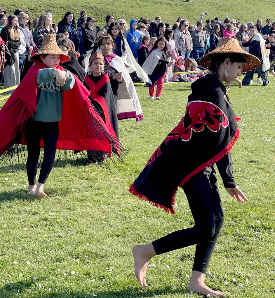 Quileute Tribe and the Quileute Tribal School students dance during the Welcoming the Whales ceremony at First Beach in La Push. (Christi Baron/Olympic Peninsula News Group)
