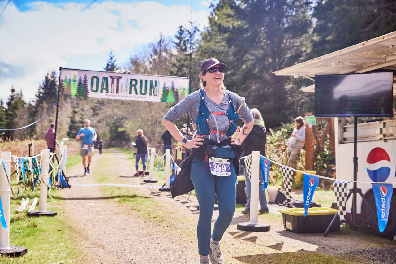 Rachel Hardies of Port Angeles finishes the half-marathon at this years Olympic Adventure Trail Run, which took place in near-perfect sunny conditions this weekend. (Matt Sagen/Cascadia Films)