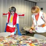 In the comic book swap corner of the Squatchcon convention are Raiden Stuntz, left, as Starscream and Quinn Valentine as Cheryl Mason, both from Port Angeles. (Dave Logan/for Peninsula Daily News)
