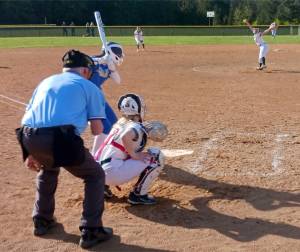 Port Angeles pitcher Lynzee Reid delivers a pitch to catcher Persephone Perry in Monday's 17-0 victory over Bremerton. Reid and Heidi Leitz combined for a one-hitter, striking out nine in just five innings. (Pierre LaBossiere/Peninsula Daily News)