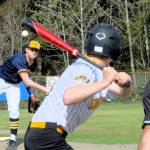Forks pitcher Conner Clark delivers the pitch to the North Beach batter on Tuesday at the Fred Orr Memorial Field where Forks took both games of this double header 8-1 and 24-3. (Lonnie Archibald/Peninsula Daily News)
