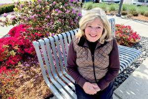 Gail Ralston, 70, is closing in on the all-time sales record for the Olympic Medical Center Foundations Great Olympic Peninsula Duck Derby. (Leah Leach/for Peninsula Daily News)