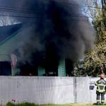 Port Angeles Fire Department responds to a residential structure fire on West 8th Street in Port Angeles. (Jay Cline)