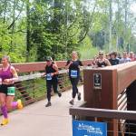 Melinda Roark (126) leads the pack at the beginning of the Sequim Railroad Bridge Run 5K and 10K on Saturday. (Pierre LaBossiere/Peninsula Daily News)