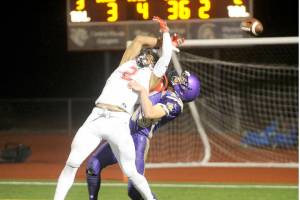 Sequim defensive back Jarrett Allen, right, defends against Steilacooms star receiver Emeka Egbuka in the second quarter of the Sentinels 49-12 Class 2A state tournament win in 2018 at Silverdale Stadium. (Michael Dashiell/Olympic Peninsula News Group)