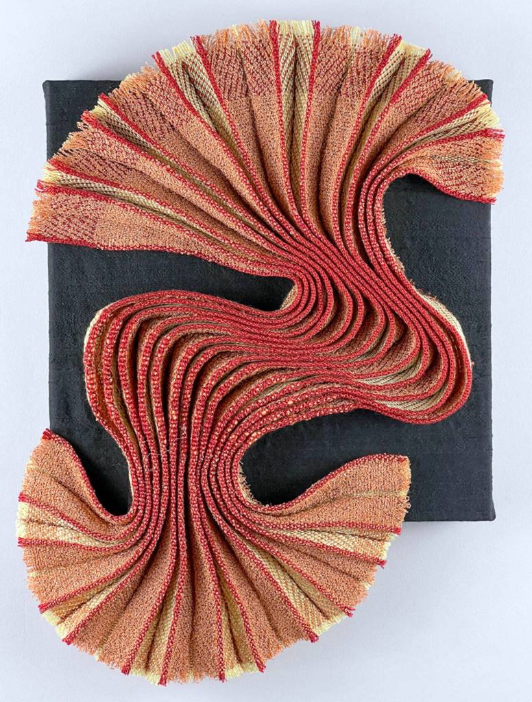 Cathy Weirs fiber art piece, Seeking Light, is on exhibit at the Port Townsend Gallery during Saturdays Art Walk.