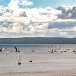 Some of the 90 sailboats in the annual 2025 Race to the Strait, from Shilshole to Port Townsend, depart Sunday on the homeward leg of the two-day race. The racers come to Port Townsend to spend the night before leaving on a downwind run home. (Steve Mullensky/for Peninsula Daily News)