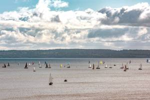 Some of the 90 sailboats in the annual 2025 Race to the Strait, from Shilshole to Port Townsend, depart Sunday on the homeward leg of the two-day race. The racers come to Port Townsend to spend the night before leaving on a downwind run home. (Steve Mullensky/for Peninsula Daily News)