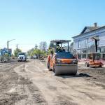 A road roller from Northern Asphalt compacts the dirt on Tyler Street in Uptown Port Townsend on Monday. The asphalt work may be finished by Wednesday to allow for striping so the street will be open in time for Saturdays Farmers Market. (Steve Mullensky/for Peninsula Daily News)