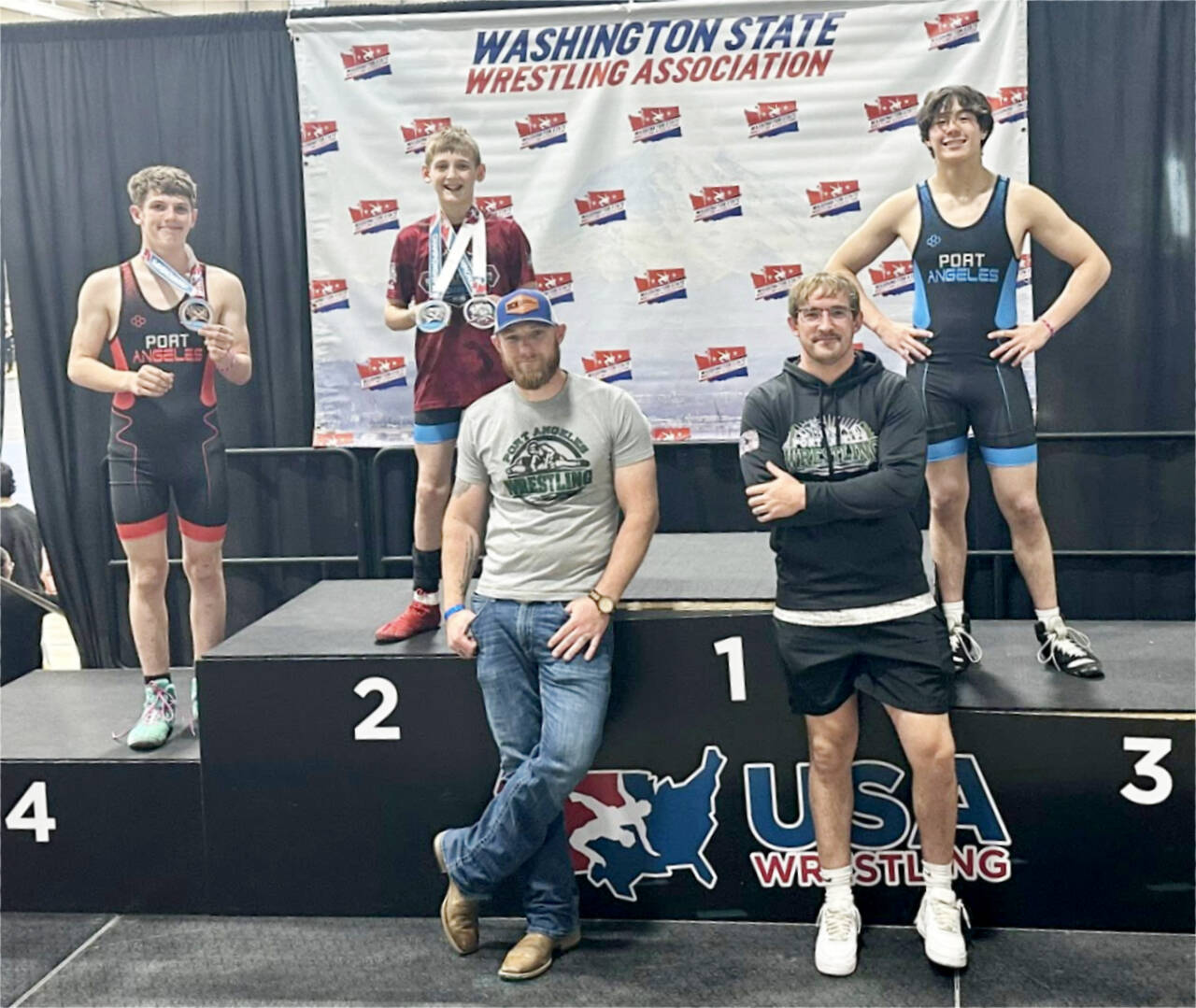 Members of the Port Angeles Wrestling Club competed in the USA Wrestling Freestyle/Greco-Roman state tournament in Spokane this weekend. From left, are Jace Collins, Carson Grooms and Crew Disher. Coaches are, from left, Rob Grooms and Dom Timpero. (Courtesy of Rob Gale)