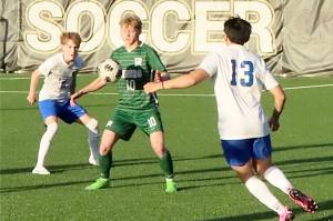 Port Angeles' Matthew Miller settles the ball against Bremerton on Tuesday at Wally Sigmar Field in Port Angeles. Miller scored a hat trick, his third of the season, as the Roughriders won 4-0 to lock up third place in the Olympic League. Port Angeles will host a district playoff game Saturday. (Dave Logan/for Peninsula Daily News)