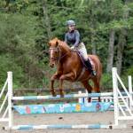 Kimi Robertson
Freedom Farm Hoof Beats member Lily Robertson and her horse Queen of Hearts (Ruby) showed excellent style and form, placing first in the 95-meter jumper class at the Bainbridge Saddle Clubs first Hunter/Jumper Show of the season.