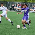Sequims Evan Cisneros (17) yells at a teammate to get into position for a pass as he controls the ball heading up field against Steilacoom on Saturday at Peninsula College. Cisneros had athe game-winning goal in overtime. (Dave Logan/for Peninsula Daily News)