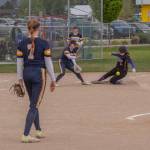 Sequims Grace Gardner beats the throw and slides safely into third base with a triple during the Wolves 10-2 win over Bainbridge on Wednesday. (Emily Matthiessen/Olympic Peninsula News Group)