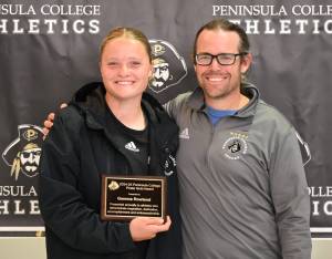 Gemma Rowland and Peninsula College womens soccer coach Kanyon Anderson celebrate after Rowland was honored with the Wally Sigmar award for soccer. The award is given to those who exemplify leadership, athleticism, academics and citizenship. (Peninsula College Athletics)