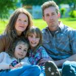 The Hanshaw family is struggling under the weight of emotional and financial stressors brought by the recent diagnoses by doctors at Seattle Childrens Hospital that have finally answered the question of why Ember, center, has always been frail. Shown with Ember are her parents, Jennifer and Tim Hanshaw, and 9-year-old sister Lena, who shares a hereditary condition with her father and sister. (Emily Matthiessen/Olympic Peninsula News Group)