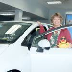 Colleen Williams of Port Angeles won a Toyota Corolla donated by Wilder Toyota in the 36th annual Great Olympic Peninsula Duck Derby. She said Tuesday she was shocked when Bruce Skinner, the executive director of the Olympic Medical Center Foundation, called her Sunday to tell her she won. All I could say is, Youre kidding me. What? Williams said. (Dave Logan/for Peninsula Daily News)