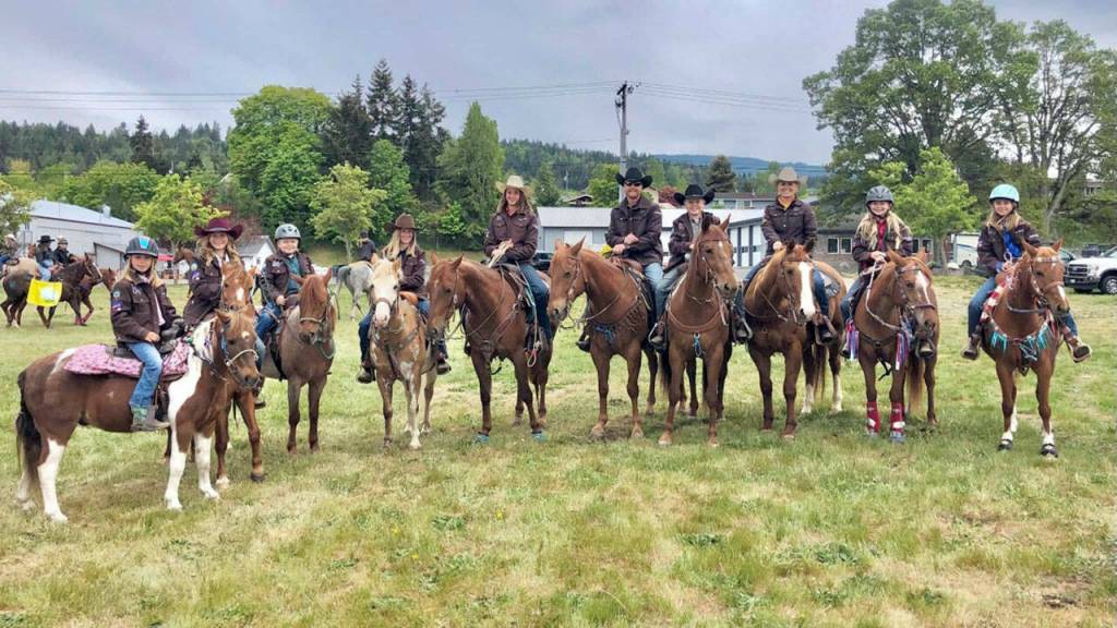 Photo by Kendra Fors
Peninsula Junior Rodeos parade participants await their turn in the equine staging area.