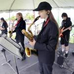 Members of the Crescent High School Jazz Band, from left, Lilly Svenson, Axel Teel, Avery Griffin and Samuel Kitts, perform as Fridays opening act at the Juan de Fuca Festival of the Arts at Vern Burton Community Center in Port Angeles. Dozens of musical acts, along with food, activities and a craft fair are highlighted across five stages during the three-day festival. (Keith Thorpe/Peninsula Daily News)