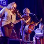 Jean Mastaler, Marcus Glaze and Aaron DeRosso of Portland-area band Falcon Heart open Saturdays musical lineup on the Juan de Fuca Festival main stage. (Keith Thorpe/Peninsula Daily News)