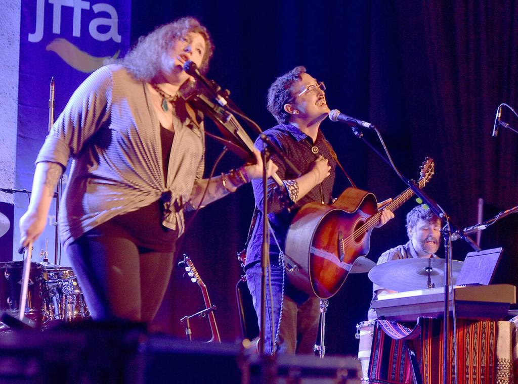 Jean Mastaler, Marcus Glaze and Aaron DeRosso of Portland-area band Falcon Heart open Saturdays musical lineup on the Juan de Fuca Festival main stage. (Keith Thorpe/Peninsula Daily News)