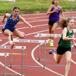 Port Angeles' Faerin Tait, front, runs in the hurdles during the Olympic League Championships at North Mason High School. Tait will compete in four events at the Class 2A State Track & Field Championship this weekend.