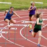 Port Angeles Faerin Tait, front, runs in the hurdles during a meet at North Kitsap High School. Tait will compete in the maximum four events at the Class 2A State Track & Field Championship this weekend.