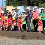 Pictured, left to right, are Randy Johnson, Clallam County Commissioner; Virginia ONeil, Olympic Peninsula YMCA Board of Directors; Rep. Steve Tharinger, State District 24; Mike French, Clallam County Commissioner; Mark Ozias, Clallam County Commissioner; LaTrisha Suggs, Port Angeles City Council; Drew Schwab, Port Angeles City Council; Glenn Smithson, 7 Cedars Casino General Manager; Lori Robbin, BCRA Design; John Vorhees, GLY Construction  all with assistance from a Y Kids crew. (Dave Logan/For Peninsula Daily News)