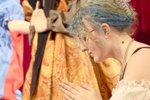 Port Angeles High School senior Madison McIntyre, foreground, will play Catherine of Aragon in Queens. Jayden Luabena, also a senior, will play King Henry VIII, and junior Felix Bubb will play the court fool. (Bear Pearcy)