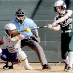 Sequim catcher Mikki Green, left, was named the Olympic League Defensive Player of the Year. Batting is Ava-Anne Sheahan of Port Angeles, who was named a second-team outfielder. (Michael Dashiell/Olympic Peninsula News Group)