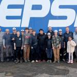 Members of the Local 155 Junior Babe Ruth team helped raised money for the team by washing a fleet of trucks belonging to Peninsula Bottling Company in Port Angeles.